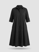 Agnes Summer Midi Shirt Dress in black — close front view showing pointed collar, concealed button-front placket and tab-roll ¾ sleeves on white background.