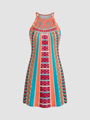 Amelia Halter Neck Mini Summer Dress, front view on grey background showing braided orange macramé halter neckline and bold multicolour vertical geometric stripe print.