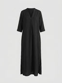 Beatrice linen-look maxi dress in black, front view showing notched V-neckline with mandarin collar, three-quarter sleeves, and side slits.