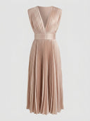 Charlotte Pleated V-Neck Midi Dress in Champagne — deep V-neckline and cinched waist, sleeveless pleated occasion dress, front view on light background.