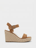 Tan brown suede-look espadrille wedge sandal with wide toe strap and ankle strap on woven jute rope sole, side view.