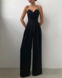 Black spaghetti strap jumpsuit with sweetheart neckline, front view on white background.