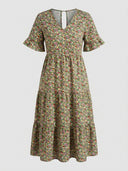 Green floral midi dress with V-neck, ruffled sleeves, and tiered skirt, front view.