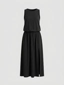 Black sleeveless maxi dress with elastic waist and side slit, front view.