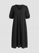 Black midi dress with V-neck, puff sleeves, and pleated bodice, front view on gray background.
