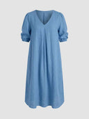 Blue midi dress with V-neck, pleated front, and puff sleeves, front view on gray background.