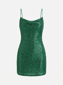 Green sequin mini dress with spaghetti straps and cowl neck, front view on white background.
