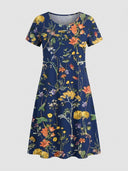 Navy blue mini dress with colorful floral print, short sleeves, and scoop neck, front view.