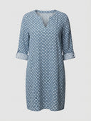 Blue and white patterned mini dress with 3/4 sleeves and split-neck, front view on a white background.