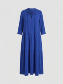 Royal blue tiered maxi dress with V-neck and tie detail, front view on a white background.