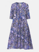 Purple floral midi dress with V-neck and buttons, front view on white background.