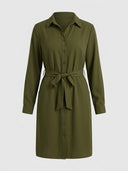 Olive green long-sleeve mini dress with collar, full button placket, and tied waist, front view.