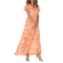 Peach botanical print maxi dress with short flutter sleeves, angled front view.