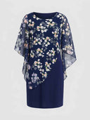 Navy mini dress with floral chiffon overlay, front view.