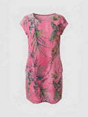 Pink mini dress with green botanical print, crew neck, and cap sleeves, front view.