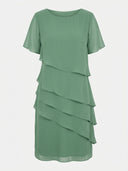 Sage green mini dress with short flutter sleeves and tiered ruffles, front view.