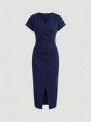 Navy blue V-neck midi dress with short sleeves and side ruching, front view.