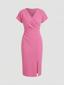 Pink V-neck midi dress with short sleeves, ruched waist, and front slit, front view on white background.