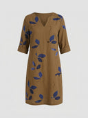 Brown V-neck mini dress with blue leaf pattern, 3/4 sleeves, front view on light background.
