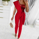 Red one-shoulder jumpsuit with sequined bodice and waist tie, front view.