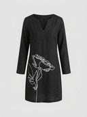 Black mini dress with long sleeves, V-neck, and white line-art floral graphic, front view.