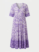 White and purple floral V-neck maxi dress with short sleeves, front view.