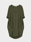 Olive green mini shirt dress with rolled sleeves and large pockets, front view.