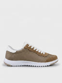 Brown lace-up low-top sneakers with canvas and suede panels, white ridged sole, side view.