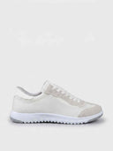 White lace-up low-top trainer with breathable mesh upper and suede overlay panels, ridged white rubber sole, side view.