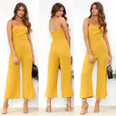 Yellow flared-leg jumpsuit with adjustable straps, shown from front and back.