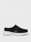 Black slip-on knit trainer with sparkle-studded upper, elasticated strap, and white sole — side view on white background.