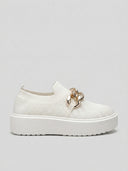 Platform slip-on trainer in White with gold chain hardware and white platform sole — side view.