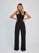 Black sleeveless jumpsuit with a cinched waist, front view on a white background.