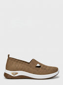 Brown knit slip-on trainer with white sole and gold accent, side view.