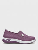 Purple knit slip-on trainers with cut-out strap vamp and white midsole, side view on white background.