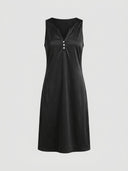 Black sleeveless midi dress with V-neck and three white buttons, front view on a light gray background.