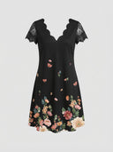 Black midi dress with scalloped V-neck, lace sleeves, and floral print, front view on white background.