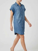 Blair Short Sleeve Denim Mini Shirt Dress in light blue, side view showing relaxed straight silhouette and curved shirt-tail hem.