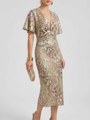 Chloe Bodycon Midi Dress — angled front view showing deep V-neckline, front twist-knot waist and sage green abstract print detail.