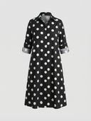 Agnes Summer Midi Shirt Dress in black and white print — front view showing pointed collar, concealed button-front placket and tab-roll sleeves on white background.