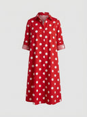 Agnes Summer Midi Shirt Dress in red and white print — front view showing pointed collar, concealed button-front placket and tab-roll ¾ sleeves on white background.