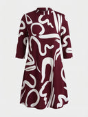 Alanna summer mini dress in bordeaux with white abstract print, three-quarter sleeves and mock collar neckline, front view
