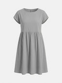 Amelia cap sleeve empire waist midi sundress in grey, front view on white background.