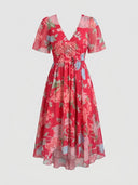 Amelia Flutter Sleeve Floral Midi Dress in pink floral print with surplice wrap V-neckline and cinched self-tie waist, front view on white background.