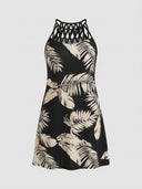 Amelia Halter Neck Mini Summer Dress in Black/Beige, palm leaf and geometric print on black ground with braided macramé halter neckline, front view.