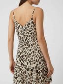 Amelia leopard print spaghetti strap mini dress, back view showing thin spaghetti straps and open-back styling.