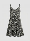 Amelia spaghetti strap mini dress in black leopard print, front view showing dark animal print colourway and ruffled drop-hem.