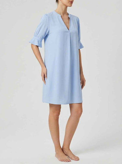Sky blue Amelia V-neck midi sundress with elbow-length ruffle flounce sleeves, side view on white background