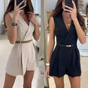 Two sleeveless jumpsuits, one beige and one black, with V-necks and belts, front view.