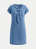 Beatrice cap sleeve bow detail mini dress in blue, front view showing fitted sheath silhouette and bow-knot neckline detail.